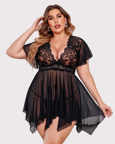 Plus-size woman in coral lace babydoll lingerie with flutter sleeves and deep V-back design.