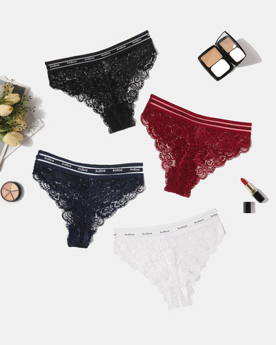 Floral lace hipster panties in pink, navy, burgundy, and white alongside makeup products.